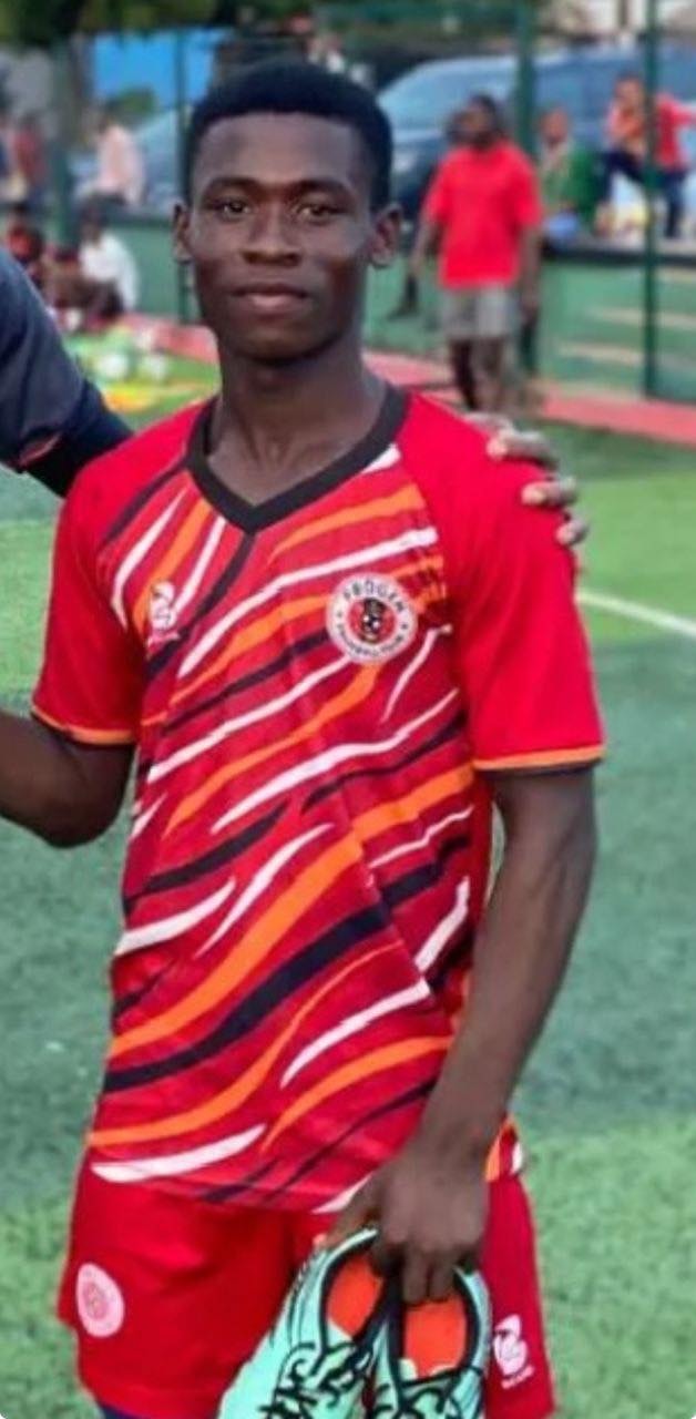 Bright Lomo in a red and white ProGen FC kit